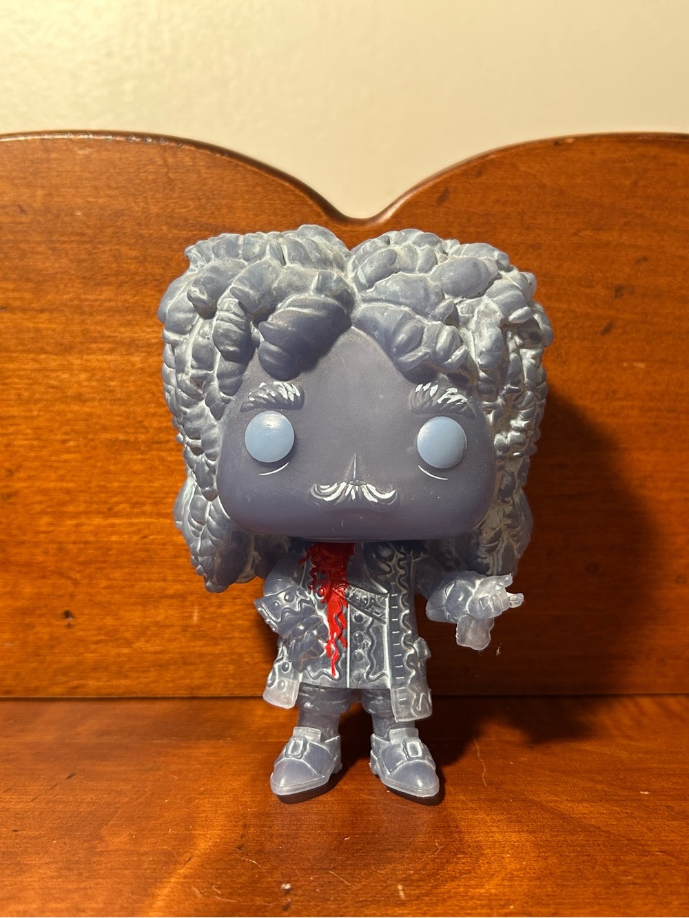 Funko Gray Vinyl Figure with Red Chest Detail